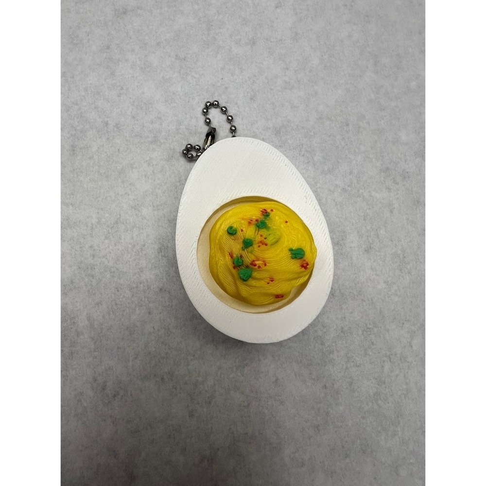 LUDO Deviled Egg Clicker EDC Fidget Toy Haptic Sensory Tool White Yellow